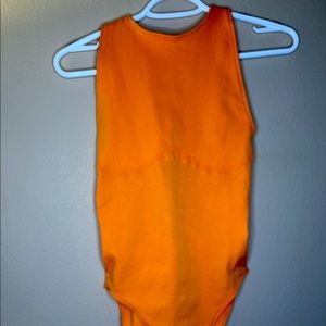 Orange Fabletics bodysuit size small new with tags